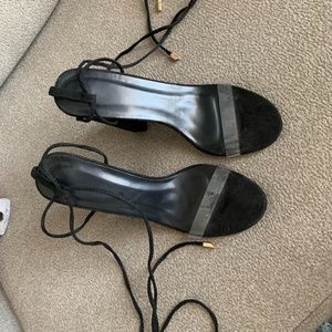 Black strap up heels